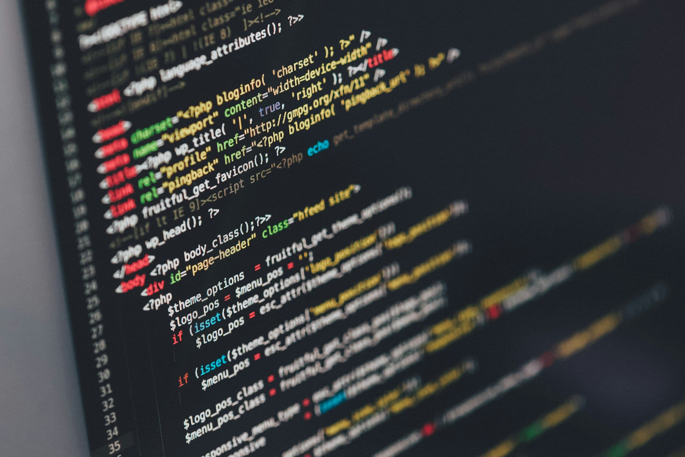 Colorful source code on a monitor, representing a custom headless front end