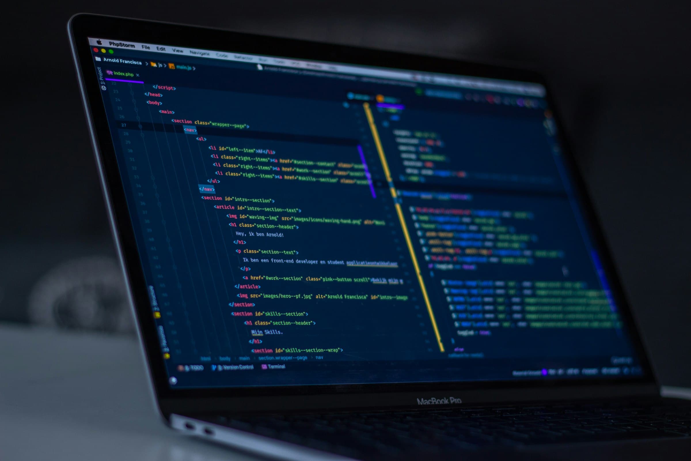 Close-up of JavaScript source code on a monitor